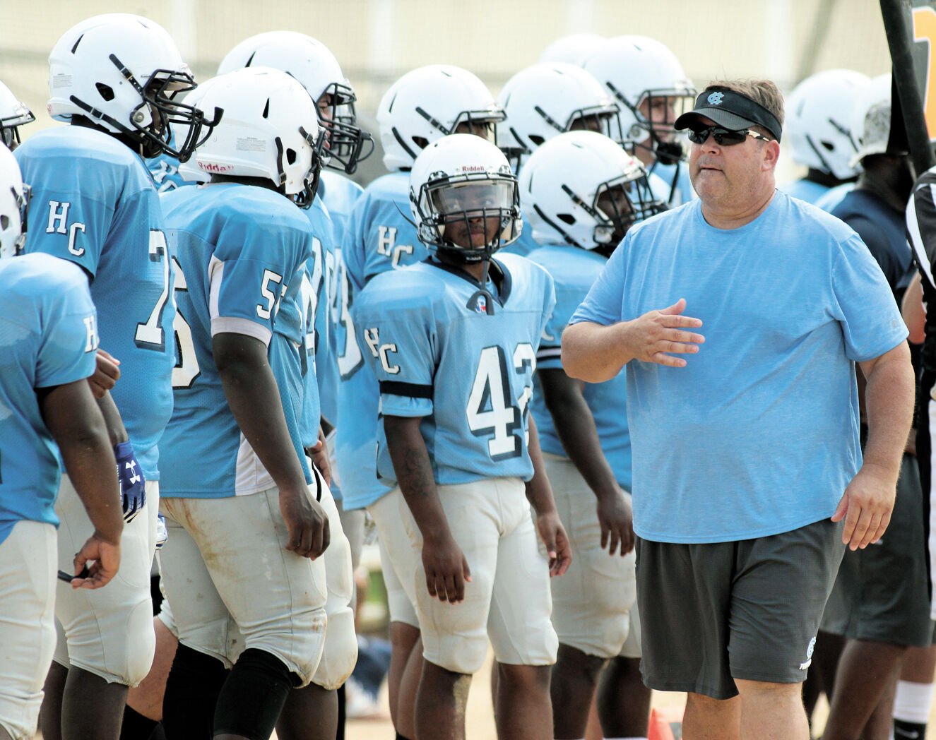 Whats the history of the Grayson High School football coach position? Learn about past coaches and their impact.