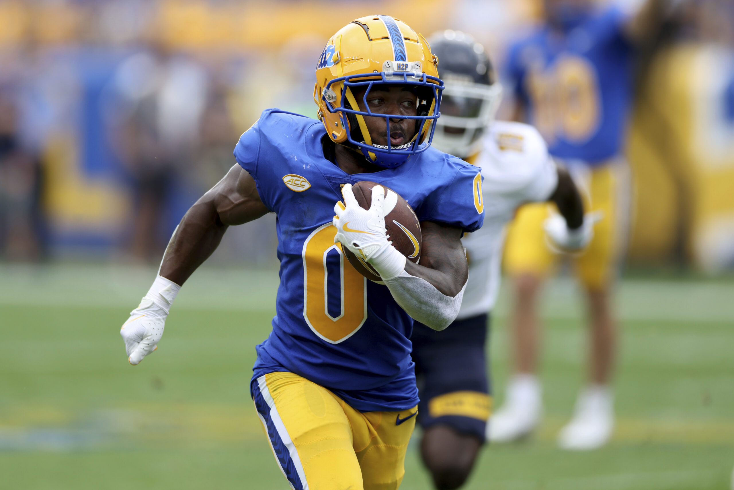 Is Desmond Reid a sleeper pick for the NFL Draft? Scouts discuss his strengths and weaknesses.