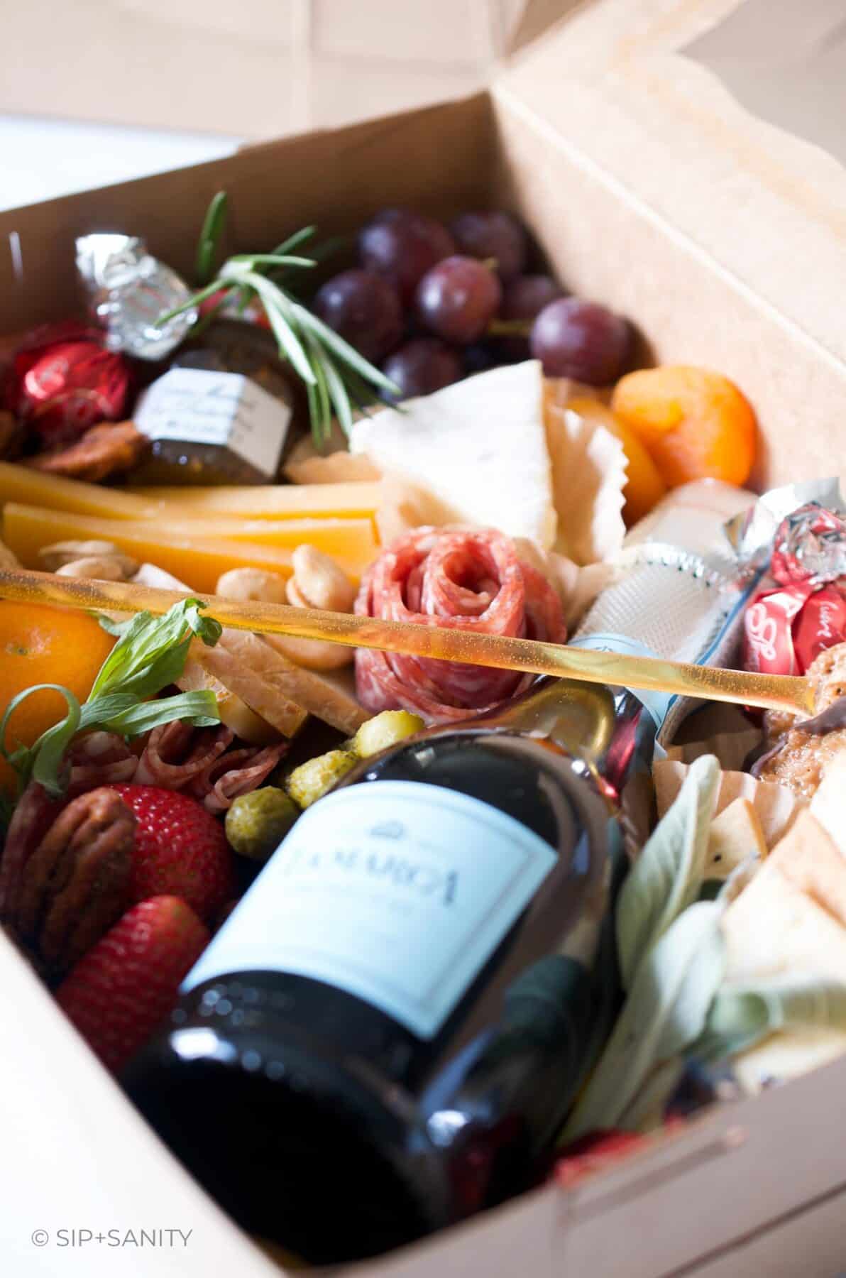 What sizes of charcuterie boxes work best for different parties?
